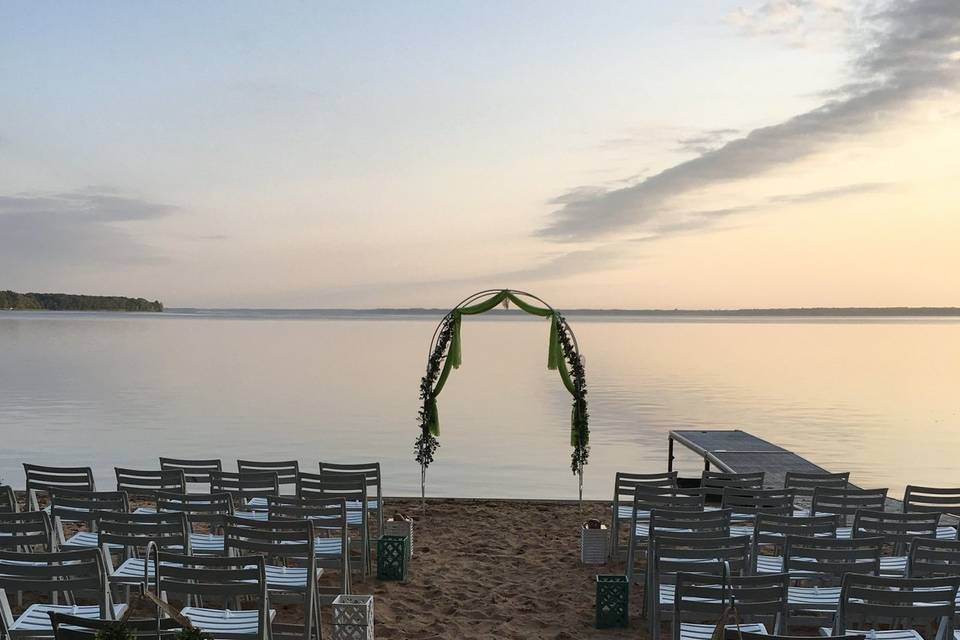 Set-up for beautiful wedding on the beach at sunset