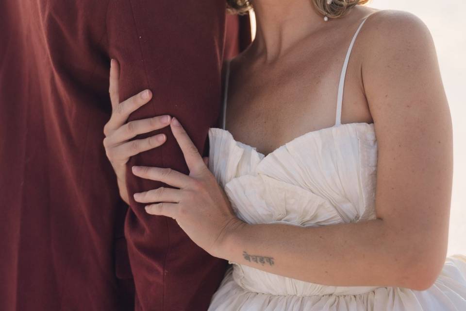 Bride and groom in water
