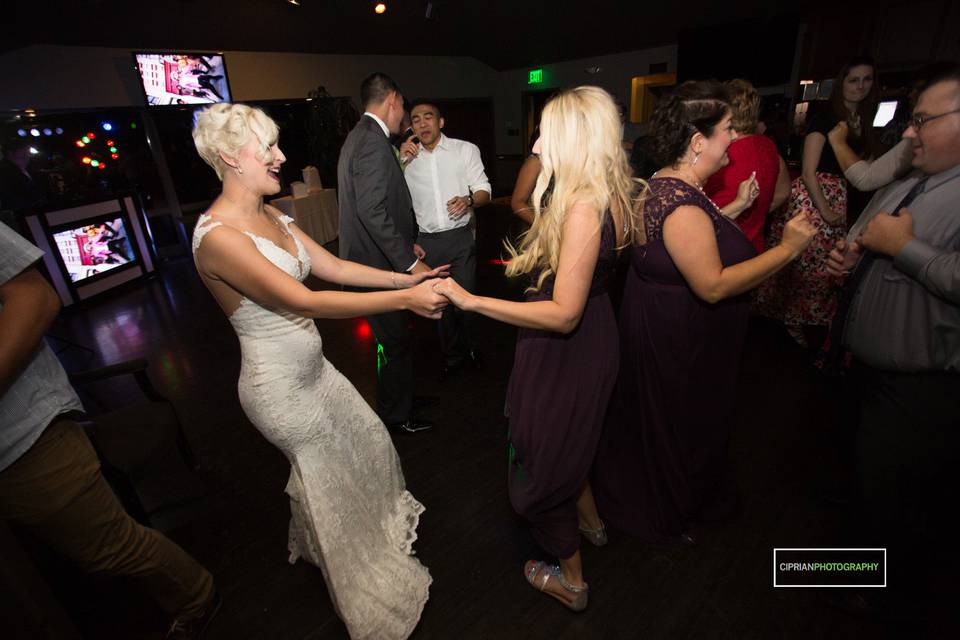 Bride dancing with her guest