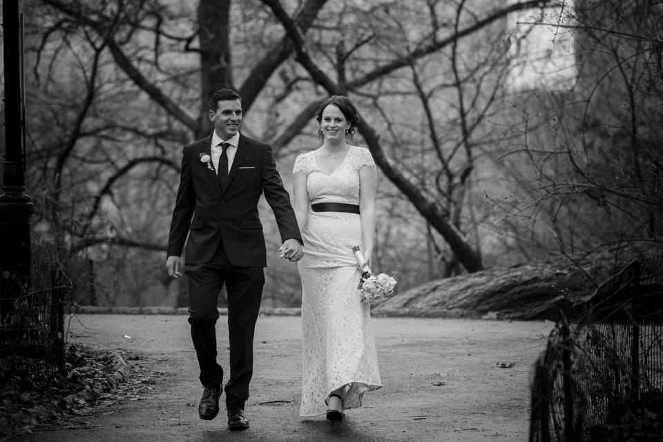 the lovely couple walking in Central Park