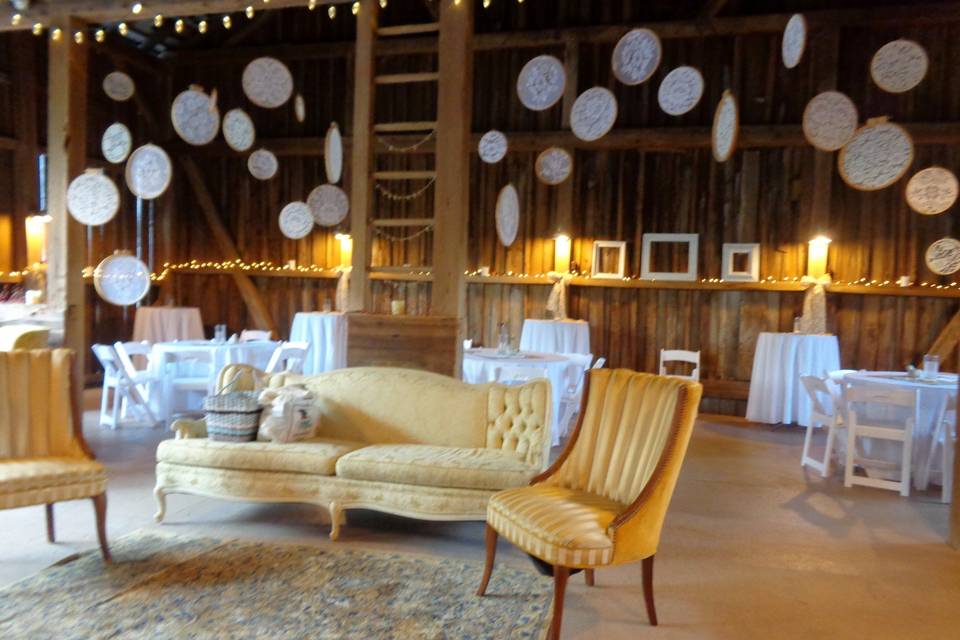 The barn can be turned into a vintage parlor with vintage furniture rentals!