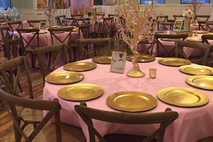 Tables covered in pink cloth