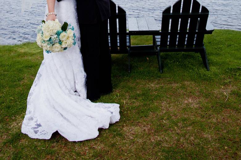 Bride and Groom photos with umbrella, toughing the rain