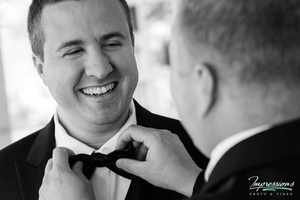 Laughing with the groomsmen