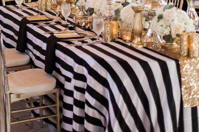 Striped table linen and floral decor