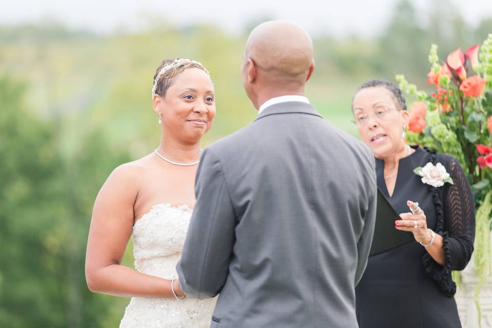 Couple with the officiant