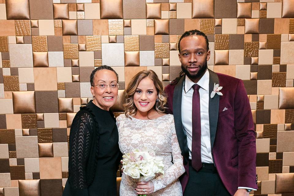 Couple with the officiant