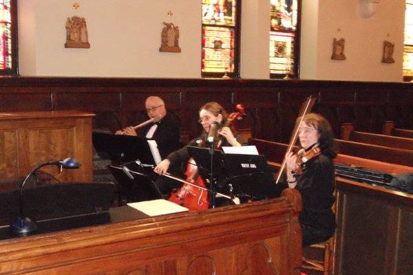 Trio performance in a church