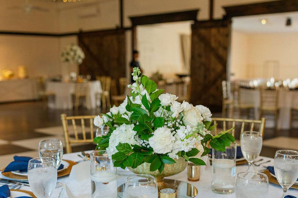 Fresh centerpiece in gold vase