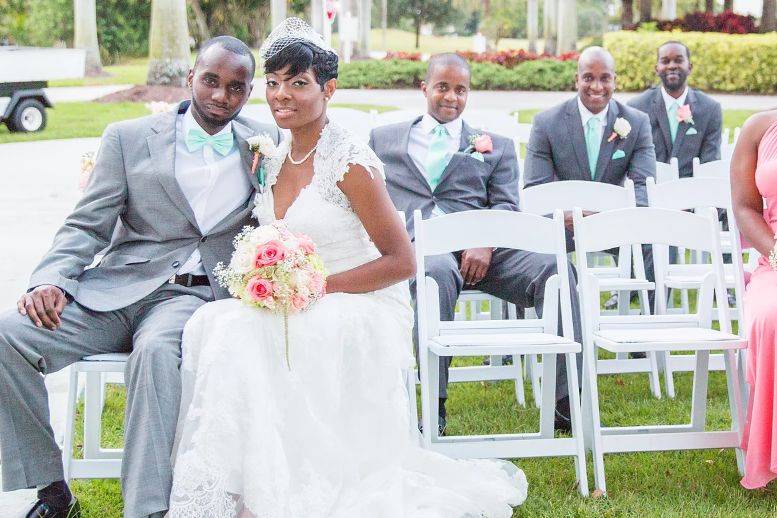 The couple with the bridesmaids and groomsmen