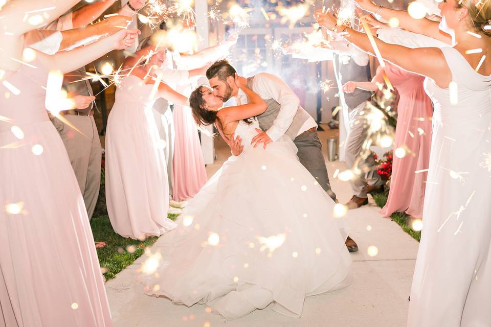 Newlyweds walking down the driveway