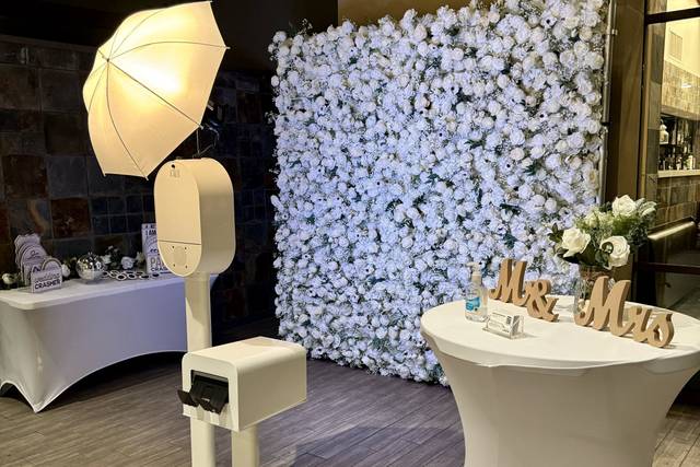 White flower wall at a wedding