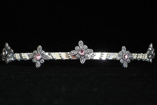 The five diamond pendants shown here are each embedded with a pale pink Swarovski Crystal.   Small silvers beads accent the band.  This tiara has a distinct and timeless design. $55