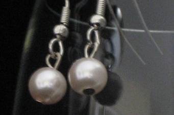 These dainty earrings have a classic look that will always be in fashion. Made with a Swarovski Pearl color of your choice. $16