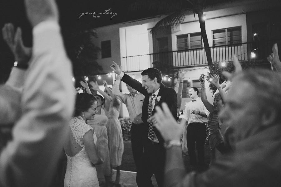 Couple with guests dancing