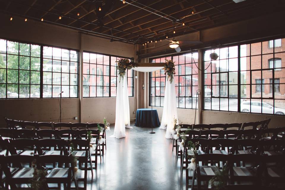 Wedding setup with decorated arbor