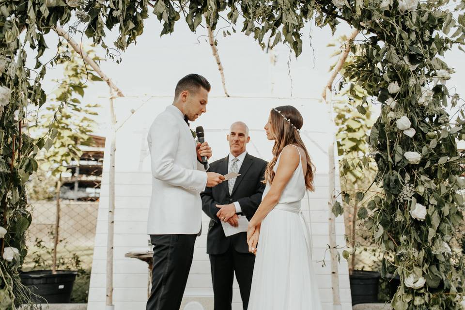 Wedding setup with decorated arbor