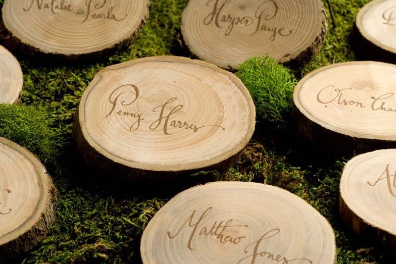 Wood slices as place cards for a rustic event.