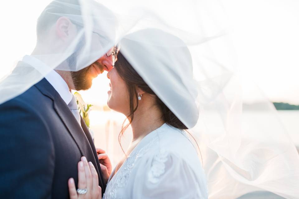 Bride and Groom under Veil