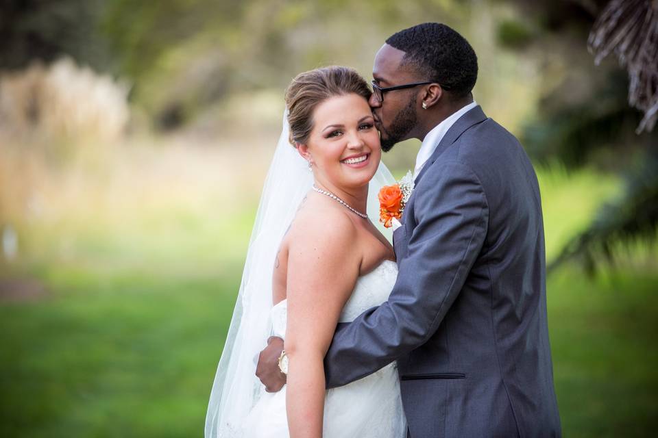 Groom kisses