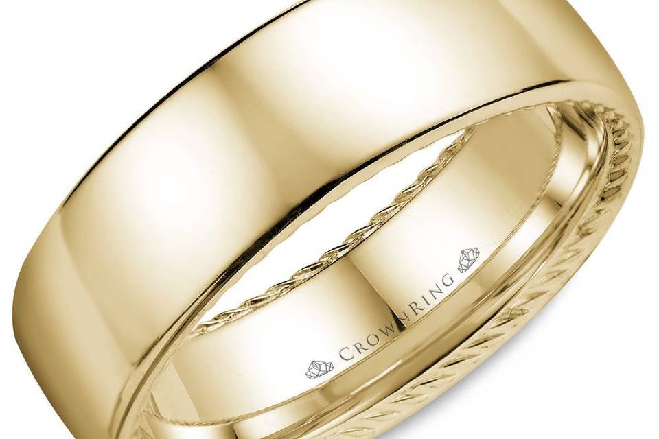 WB-012R7YThis classic men's wedding band in yellow gold with hidden rope detailing is as unique as your love.METAL: YellowWIDTH: 7mmOther Availability: This ring is available in 10K, 14K, 18K (White, Yellow & Rose gold), Platinum & Palladium.