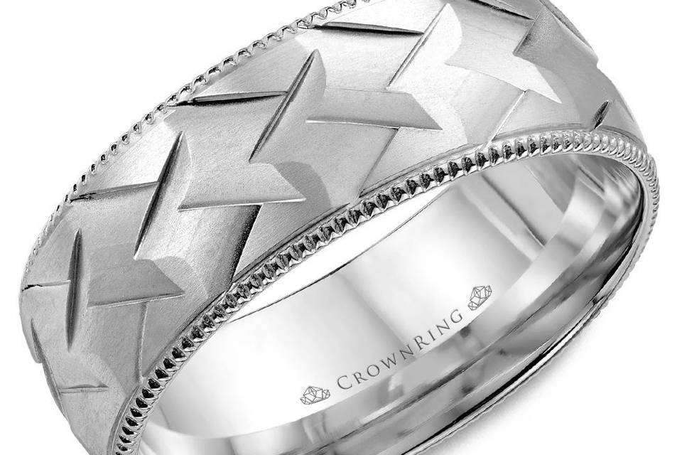 WB-7912A fashionable white gold men's wedding band with a patterned center and milgrain detailing is an eternal symbol of love with a twist.METAL: WhiteWIDTH: 8mmOther Availability: This ring is available in 10K, 14K, 18K (White, Yellow & Rose gold), Platinum & Palladium.