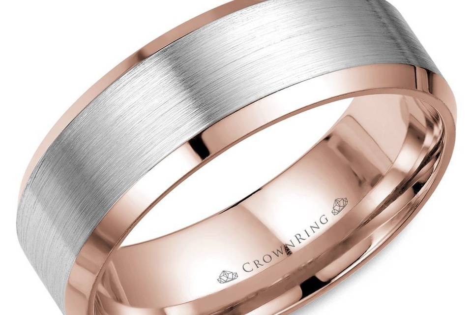 WB-7131WRA white gold band with a sandpaper finished centre & rose accents make this men's wedding band a perfect symbol of your lifelong commitment.METAL: W&RWIDTH: 8mmOther Availability: This ring is available in 10K, 14K, 18K (White, Yellow & Rose gold), Platinum & Palladium.