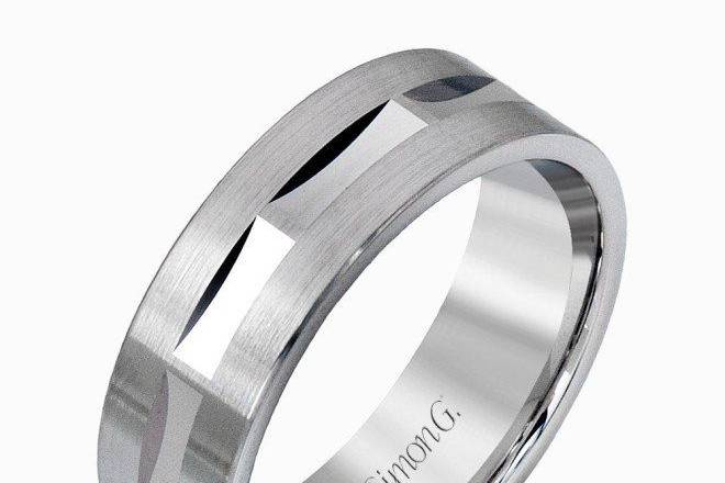 SIMON GLG115Presenting a minimalistic yet striking design, this elegant white gold men’s wedding band features a sleek, polished appearance that will hold up to the test of time.
