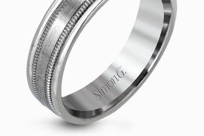 SIMON GLG144Elevating a classic design to contemporary levels, this platinum men’s wedding band features a brushed center column outlined by twin milgrain edges.