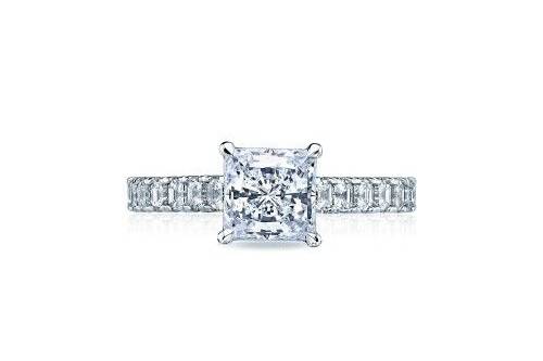 TACORI35-25pr65 This Tacori engagement ring glows with asscher cut diamonds halfway around the band, and a princess cut center diamond. The 2.5mm band is highlighted with a clean crescent engraving, and signature Tacori crescent below.
