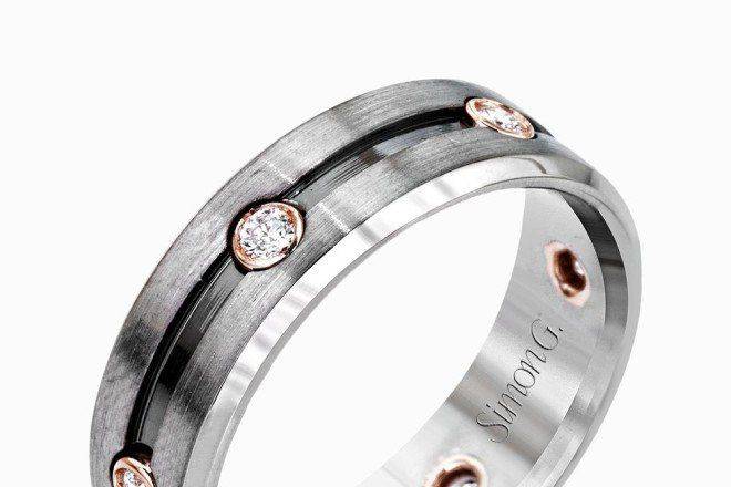 SIMON GLP2187Featuring a sleek modern design, this men’s gray gold band features rose gold accents and is set with .23 ctw round cut white diamonds.