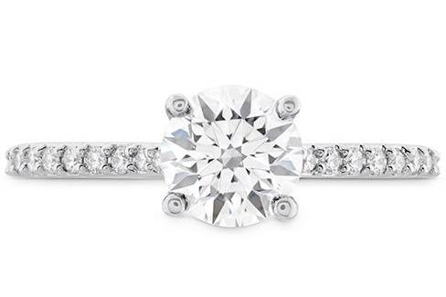 HEARTS ON FIRECAMILLA HOF ENGAGEMENT RINGThe Camilla HOF engagement ring is definitely a ring that stands out from from the rest. The uniquely HOF round center diamond will automatically cause attention to your ring finger.