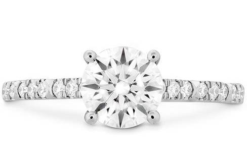 HEARTS ON FIRECALI CHIC DIAMOND ENGAGEMENT RINGA beautiful diamond engagement ring with dainty feminine appeal, the Cali Chic ring style is perfect for any woman. Its classic solitaire design dazzles on a thin band of perfectly cut diamonds, resulting in a sparkle that you will love forever.