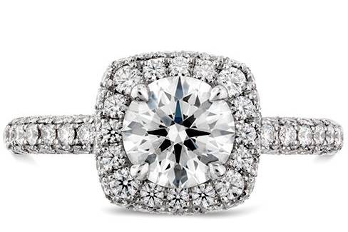HEARTS ON FIREEUPHORIA PAVE ENGAGEMENT RINGThis stunning engagement ring is truly euphoric as the double halo sets a dazzling stage for the center stone. Three sparkling rows of diamonds add even more sparkle to this show-stopper, making it the ideal ring for a woman who loves to stand out.