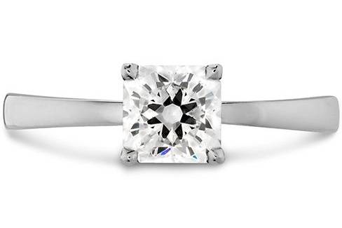 HEARTS ON FIREDREAM SIGNATURE SOLITAIRE ENGAGEMENT RINGA beautiful Dream cut diamond is the focal point of this classic solitaire. With hidden hearts surrounding the galley of the diamond, the Dream Signature Solitaire Engagement Ring is a romantic way to symbolize your love.