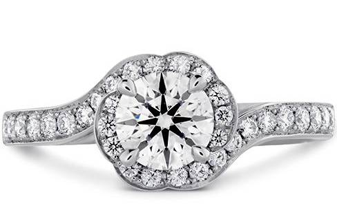 HEARTS ON FIRELORELEI BLOOM ENGAGEMENT RING-DIAMOND BANDA floral setting with soft, scalloped edges boasts a halo of diamonds for a vintage, yet feminine look in the Lorelei Bloom Engagement Ring with Diamond Band. Additional diamonds dazzle on the band of this engagement ring, giving it a unique sparkle truly unlike any other.