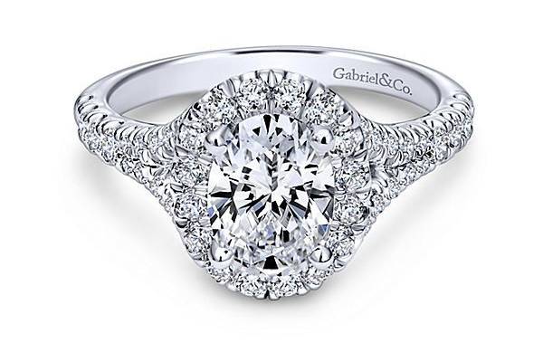 GABRIEL & COKENNEDYYour center stone comes to life with this bold and beautiful halo setting Daring diamonds embrace your center stone while our alluring band shines ever so brightly.