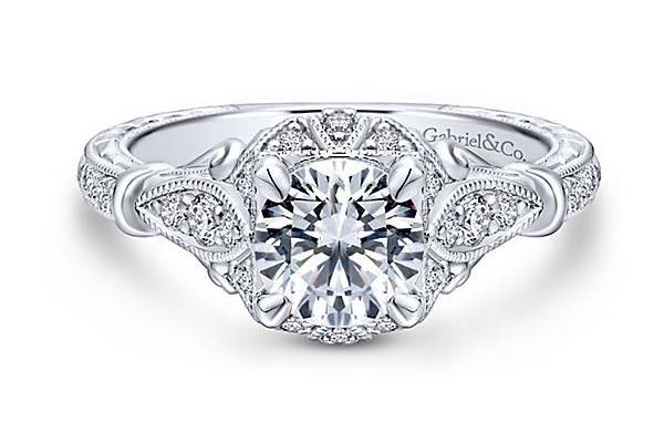 GABRIEL & COMONTGOMERYA hand etched band and exquisite detailing in this enchanting 14k white gold Empire engagement ring will forever be a treasure.