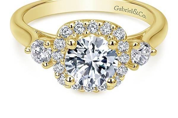 GABRIEL & COMARTINEAstonishing diamonds border this 14k Yyellow gold diamond engagement ring with sophistication. This straight styled ring is contemporary and sleek.