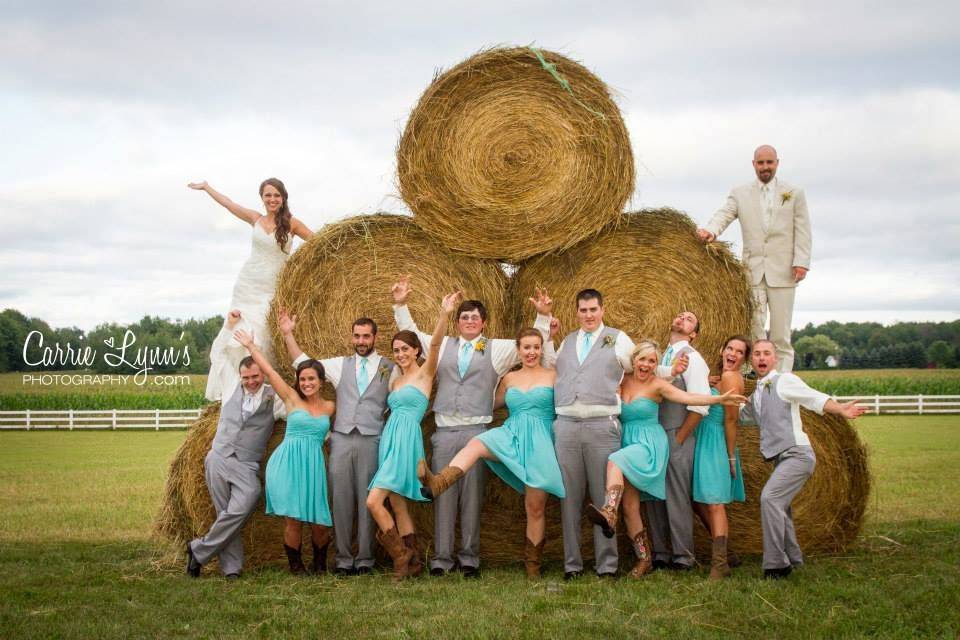 The couple with the bridesmaids and groomsmen