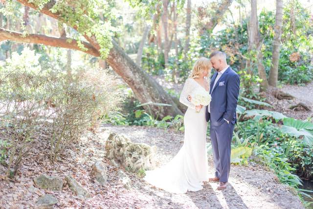 Bride & Groom walk through the woods