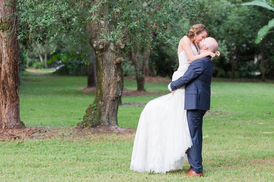 Bride & Groom embracing outside