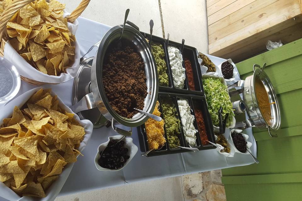 Think out of the box with our fabulous nacho bar!  Your guests can make their own creation!