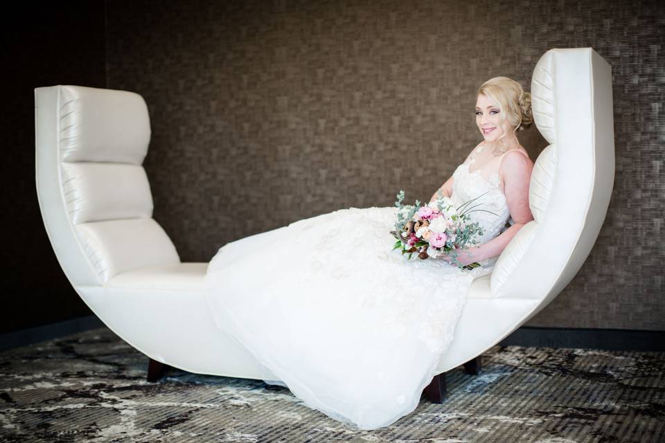 Bride on the couch | Photo by: Freeland Photography