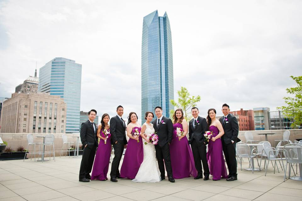 This couple had their first look and wedding party photos on the Museum's Roof Terrace before going to their ceremony at a local church.Photo Credit: Travis + Haley G