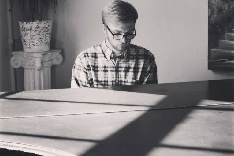 Carsten practicing on a piano in England.