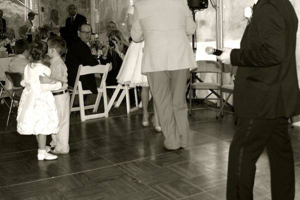 Father-Daughter dance sung by Adam James as another cute couple joins them on the dance floor.