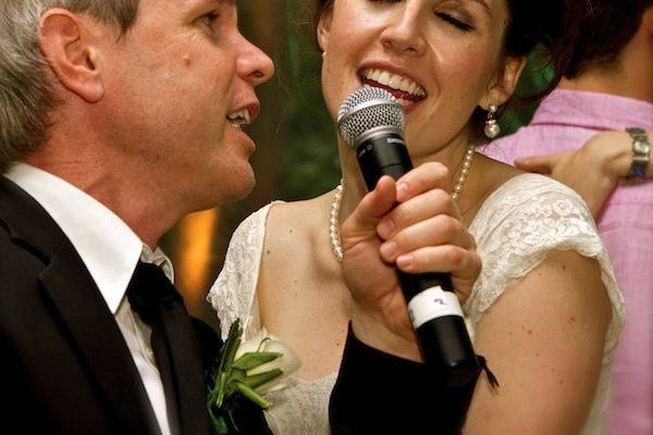 Adam sings with Lauren, The Bride on the dance floor in South Barrington Illinois.