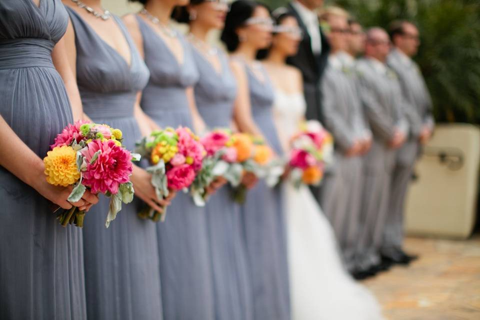 The couple with the bridesmaids and groomsmen