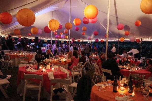 Reception tent and tables, dancing at night